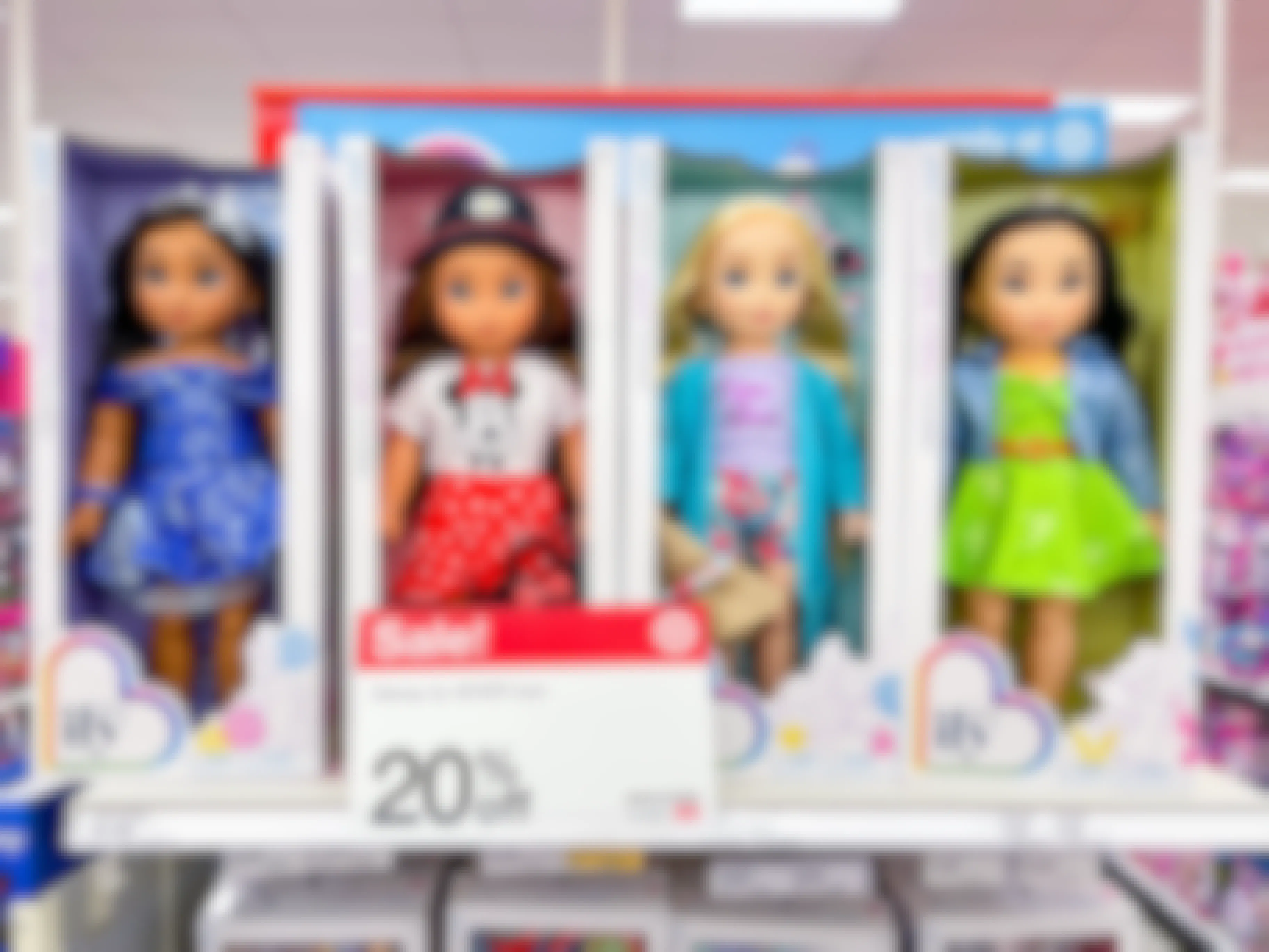 Disney i love you 4 ever dolls on the shelf at Target with a 20% off sale sign