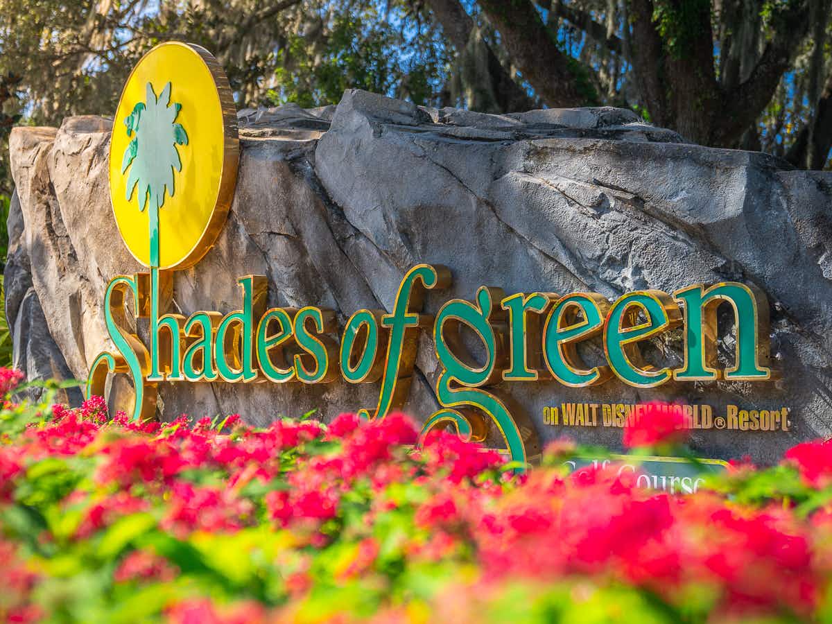 A sign for the Disney Shades of Green hotel