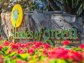 A sign for the Disney Shades of Green hotel