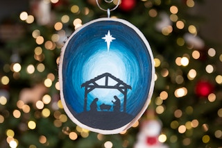 Wood slice Nativity stencil ornament
