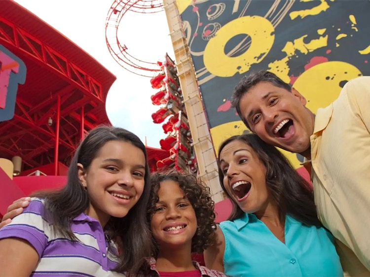 excited family at universal studios rip ride rockit