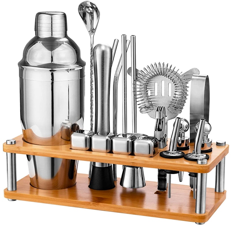 A Cocktail Shaker Set in a wooden organizer