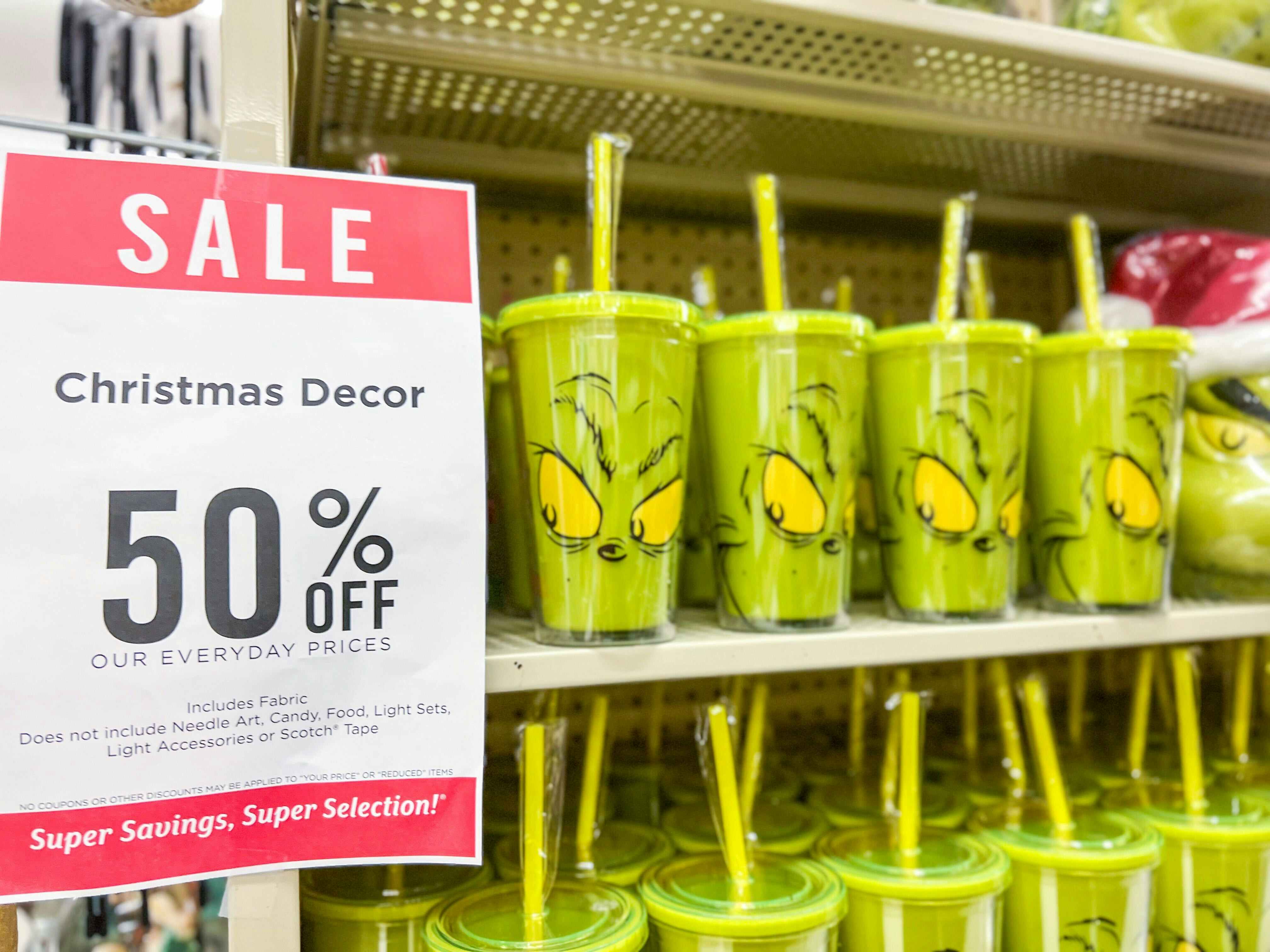 hobby lobby grinch decor with 50% off signage 