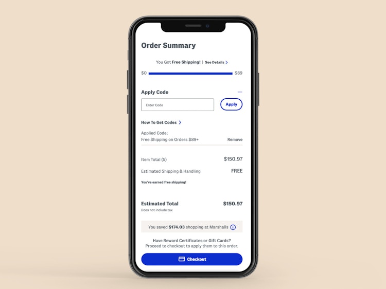 a phone showing the online checkout process with a free shipping promo code entered