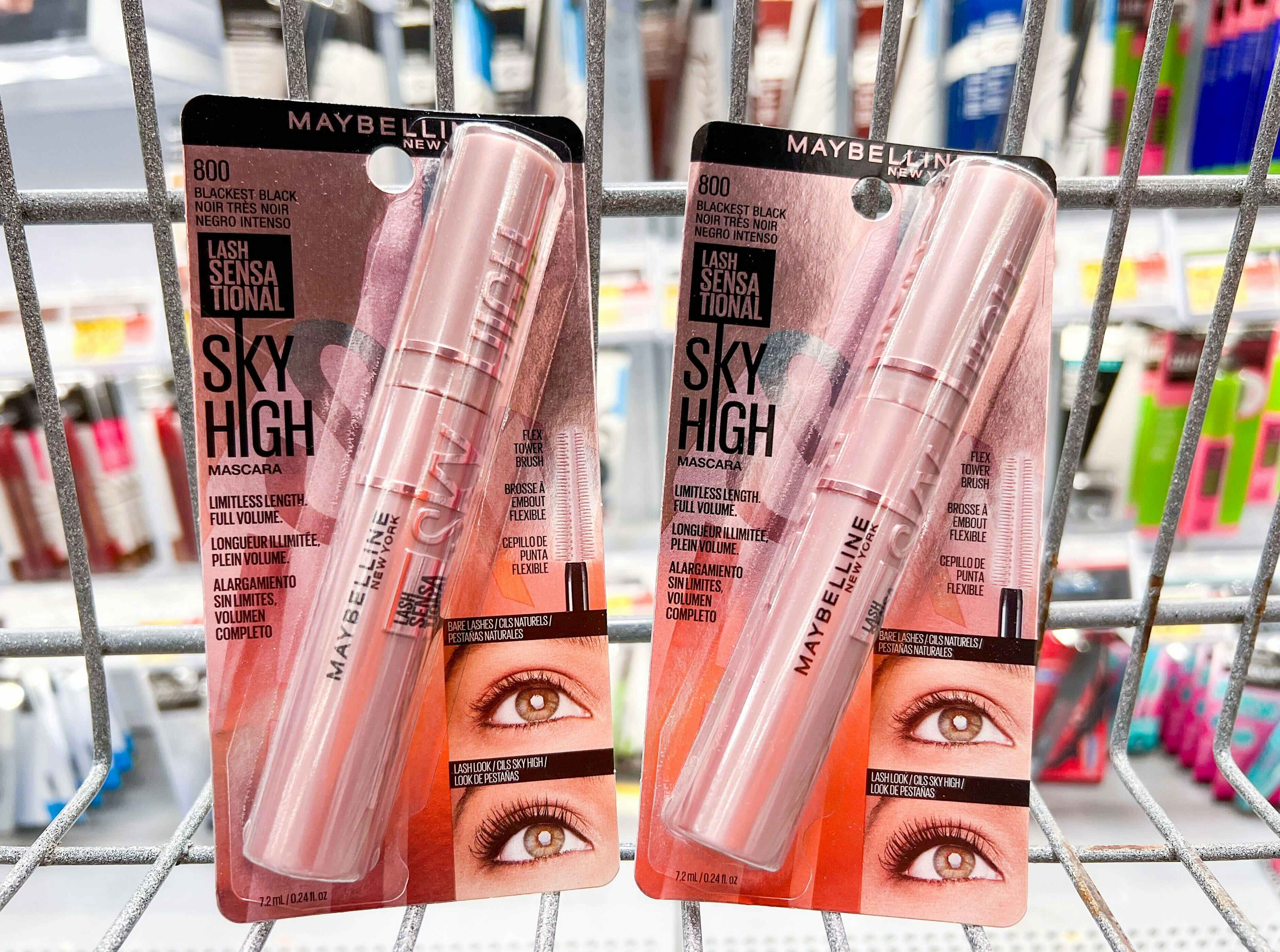 Hand holding two packs of Maybelline Sky High mascara