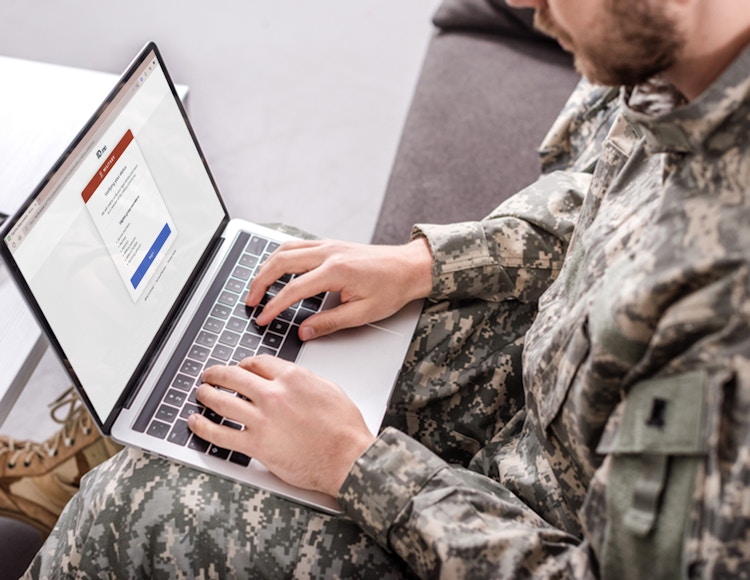 man in the military on laptop looking at id me website