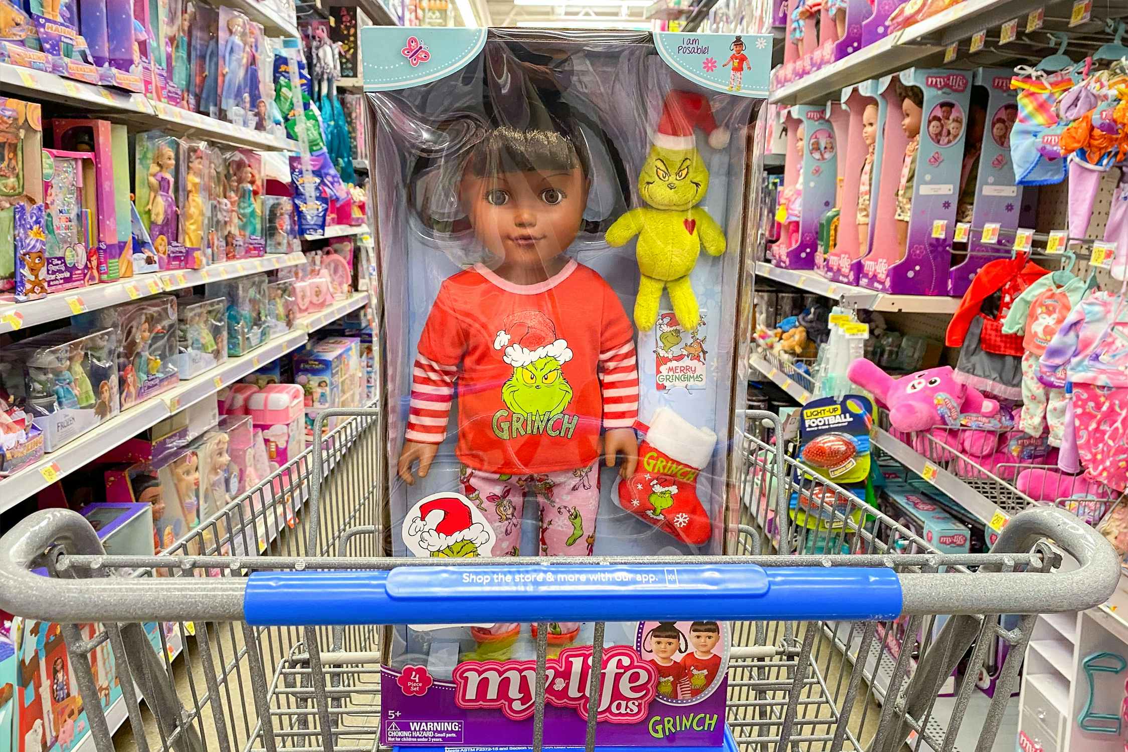 a my life as grinch doll in a walmart cart