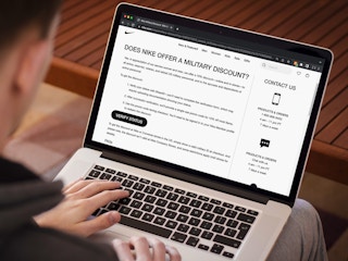 A person looking at the Nike website's page about their Military discount