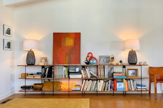 Console table with miscellaneous items in a living room