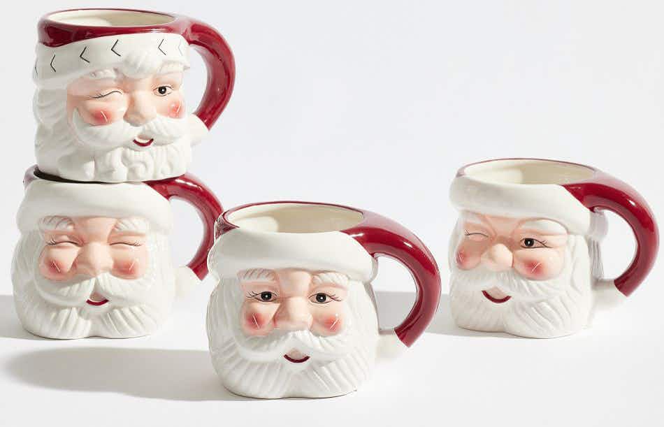 vintage santa mugs - A set of Santa Claus Mugs on a white surface