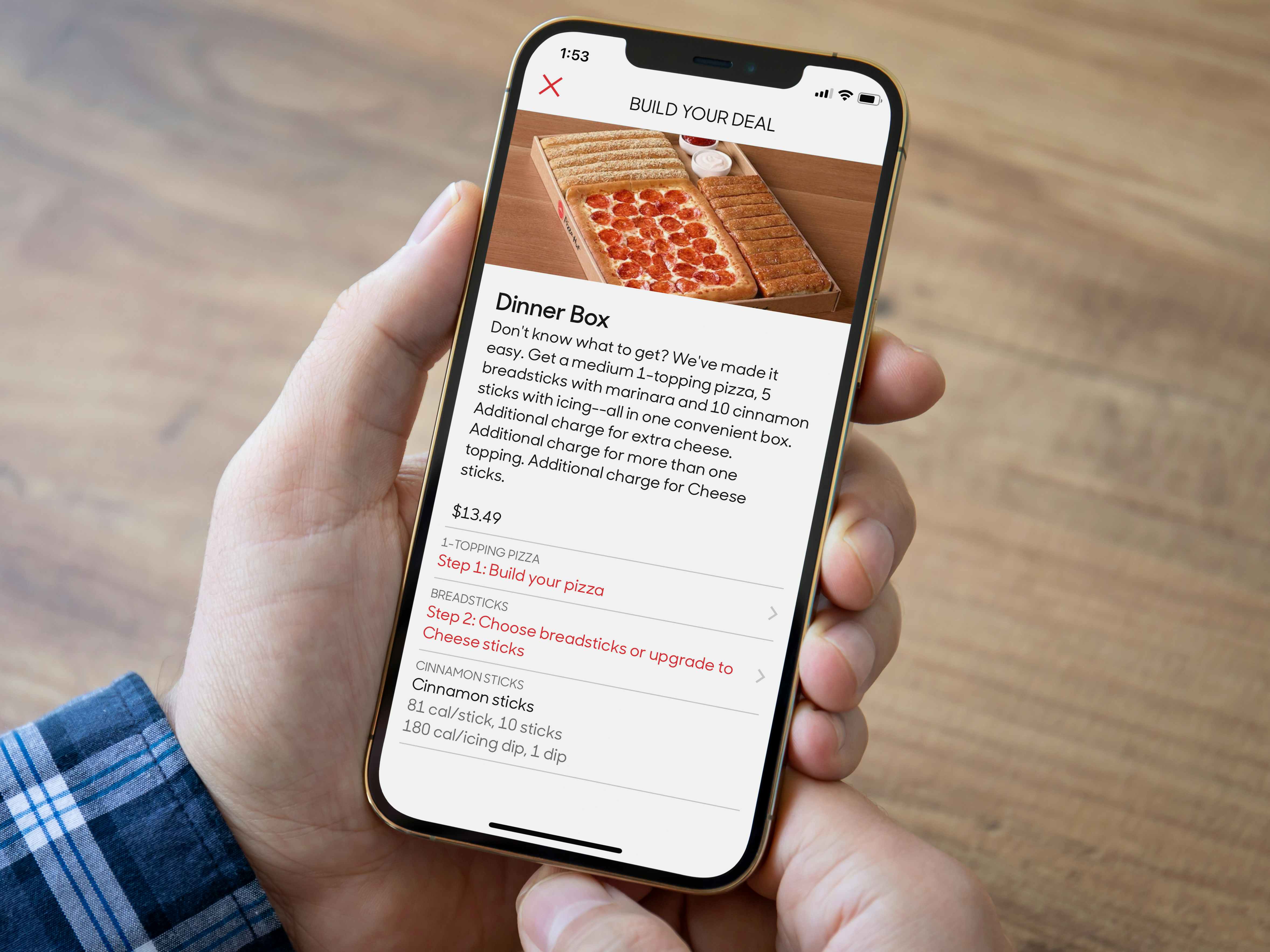 A person ordering a Pizza Hut Dinner Box on the app