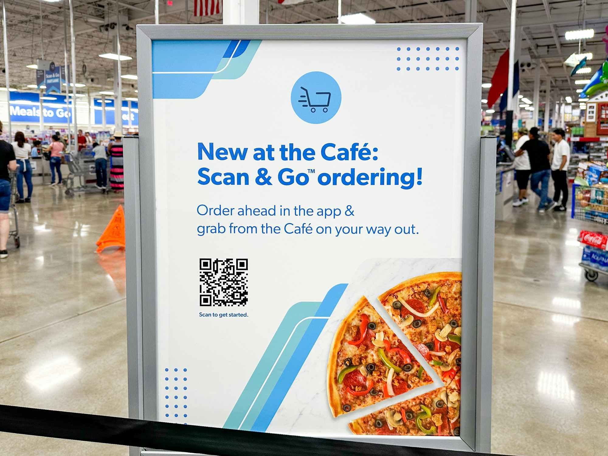 A sign in Sam's Club about the Cafe Scan & Go ordering