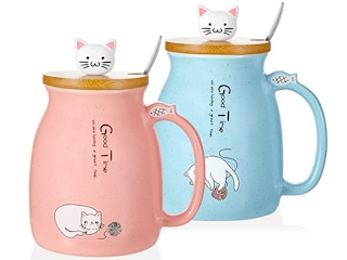 two cute mugs with a kitty topper