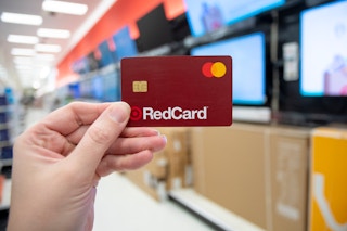 hand holding target redcard in store electronics section