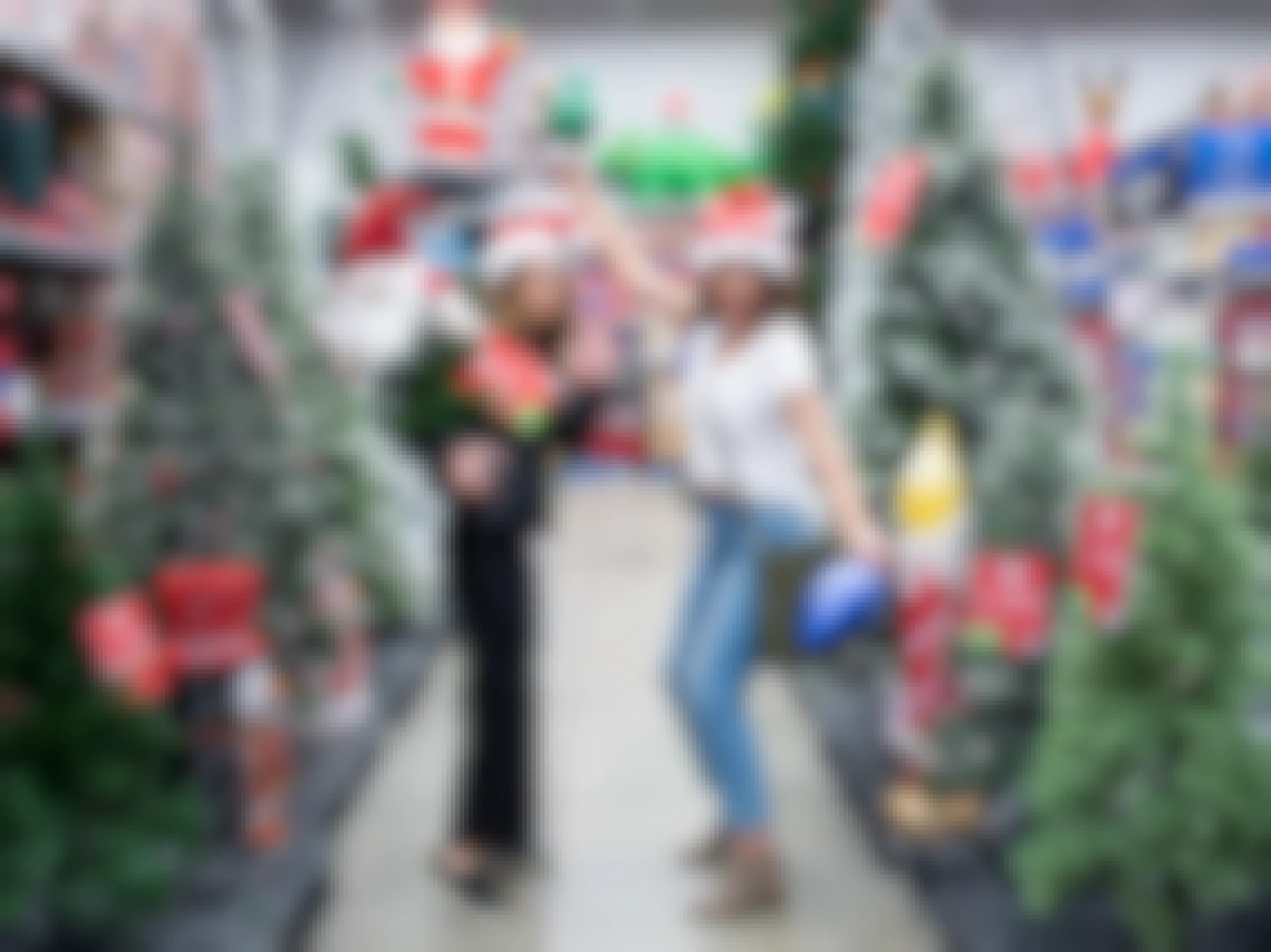 Two people shopping for Christmas items in Walmart