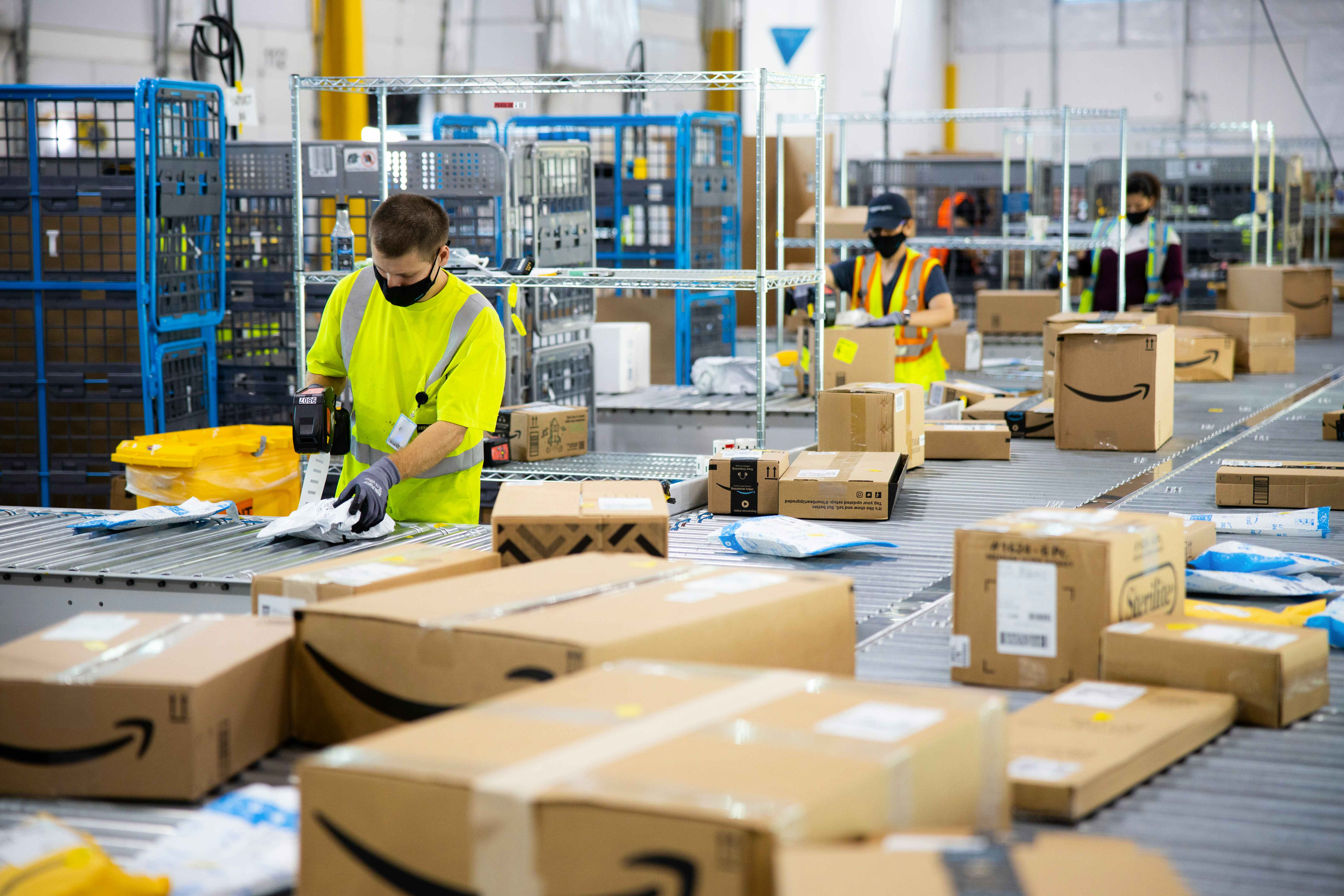 Amazon employees working in a warehouse