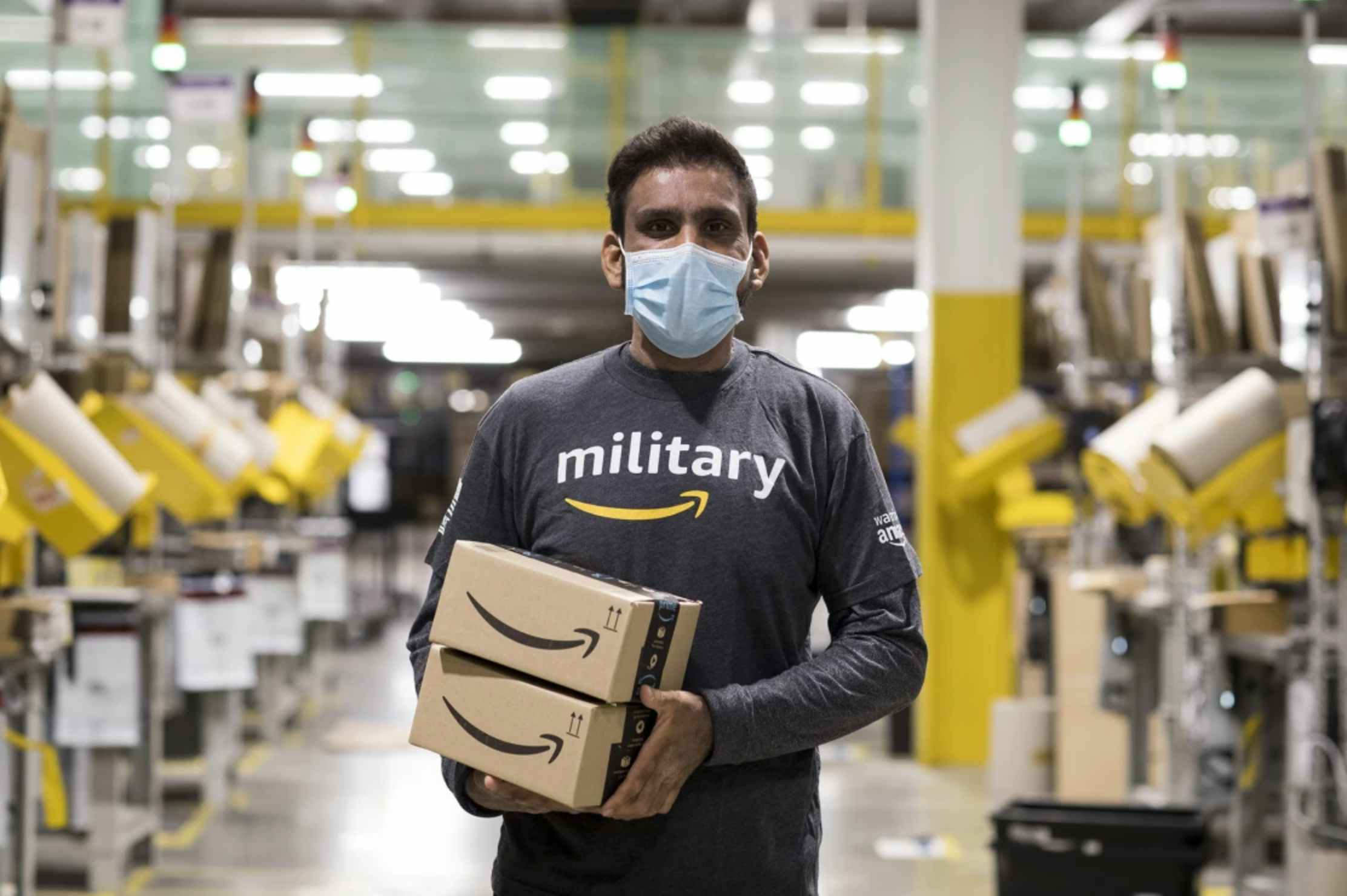 An amazon employee in a military shirt.