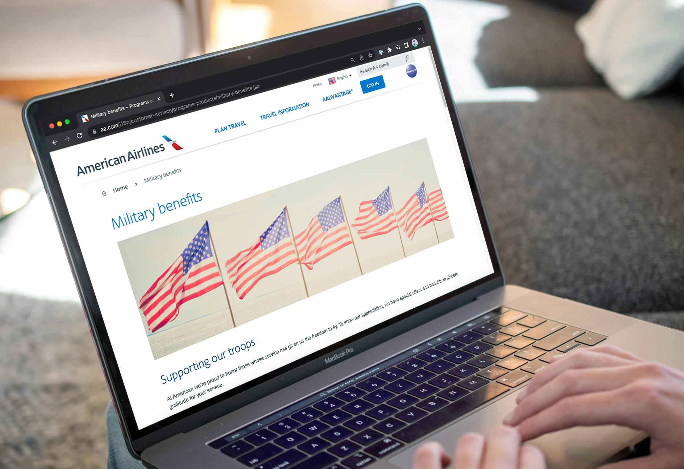 A person looking at the American Airline websites' page for military discounts