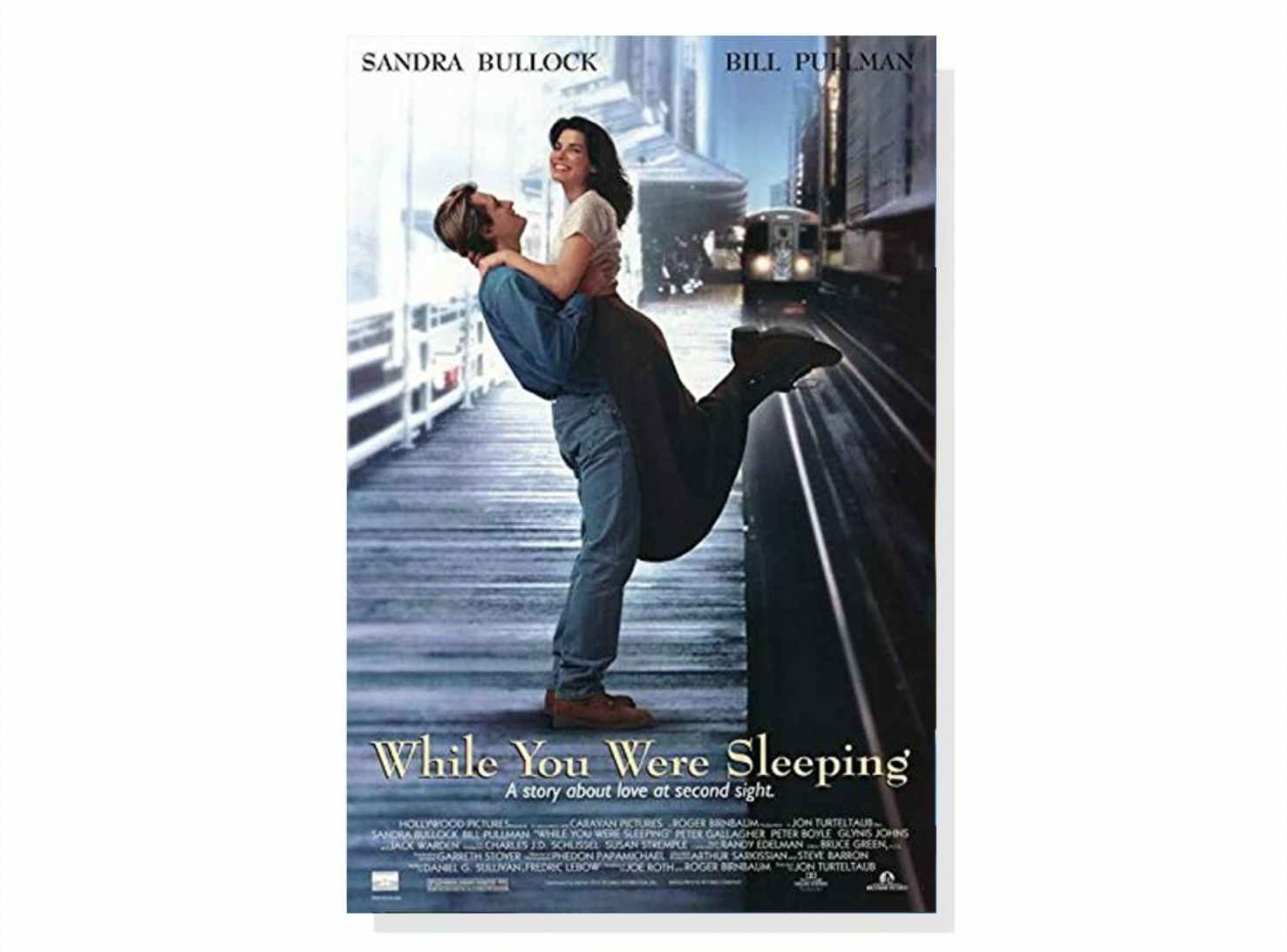 Movie poster for While You Were Sleeping, one of the best Christmas movies on Disney Plus.