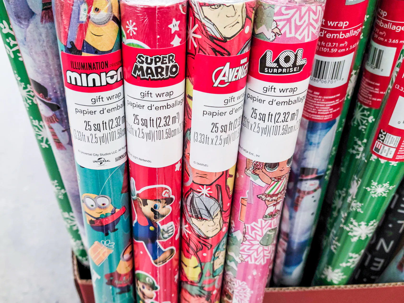 Rolls of licensed character wrapping paper at Dollar Tree