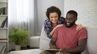 Couple car shopping via a tablet