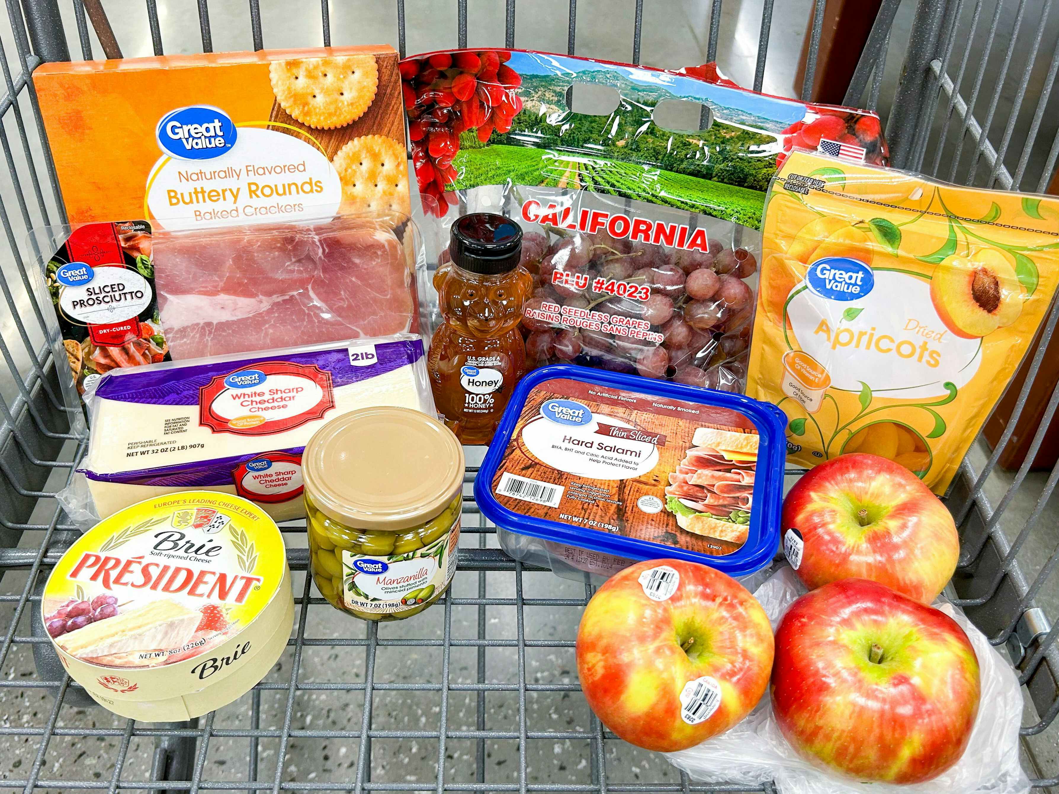 Charcuterie board ingredients in a shopping basket