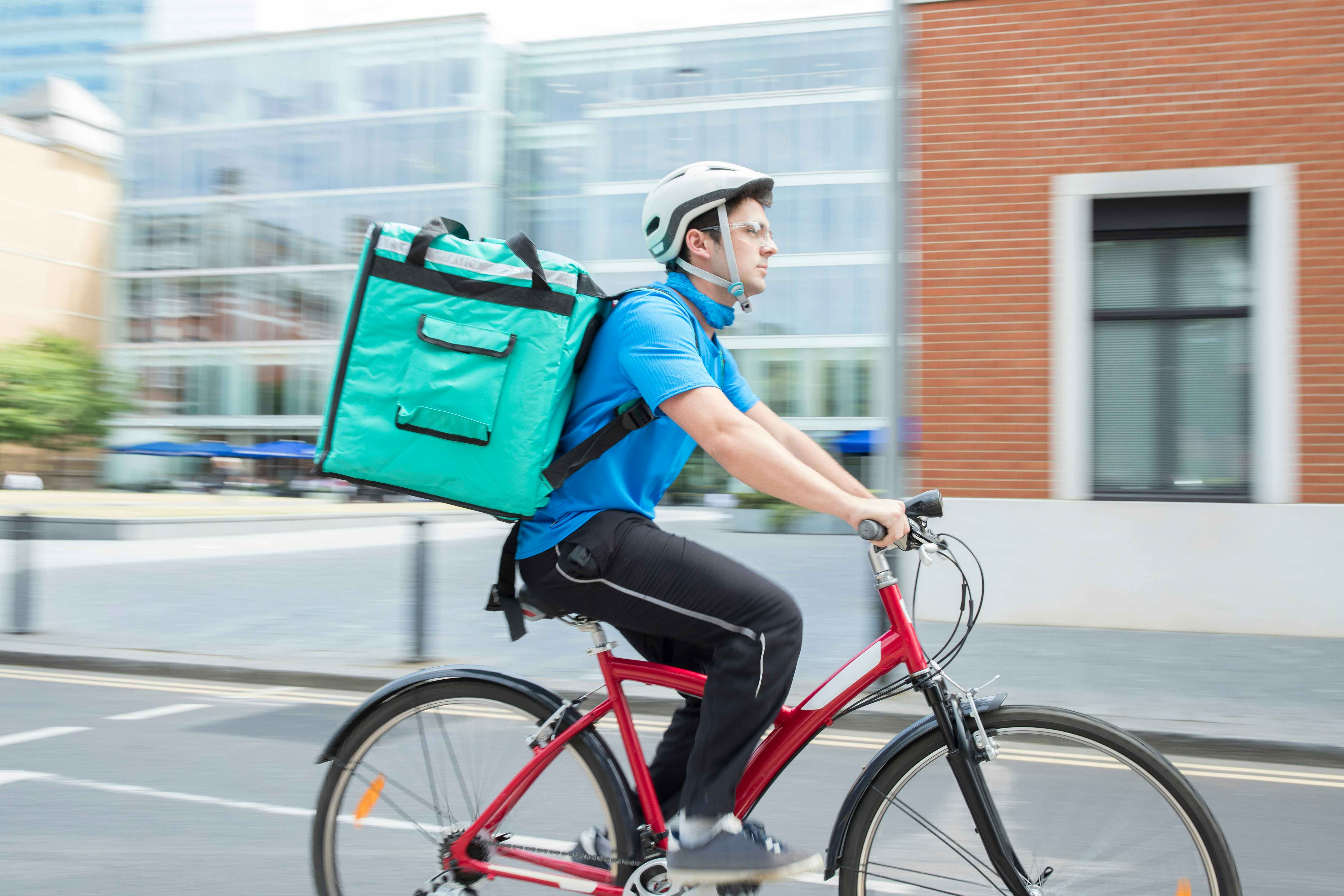 Courier riding a bicycle