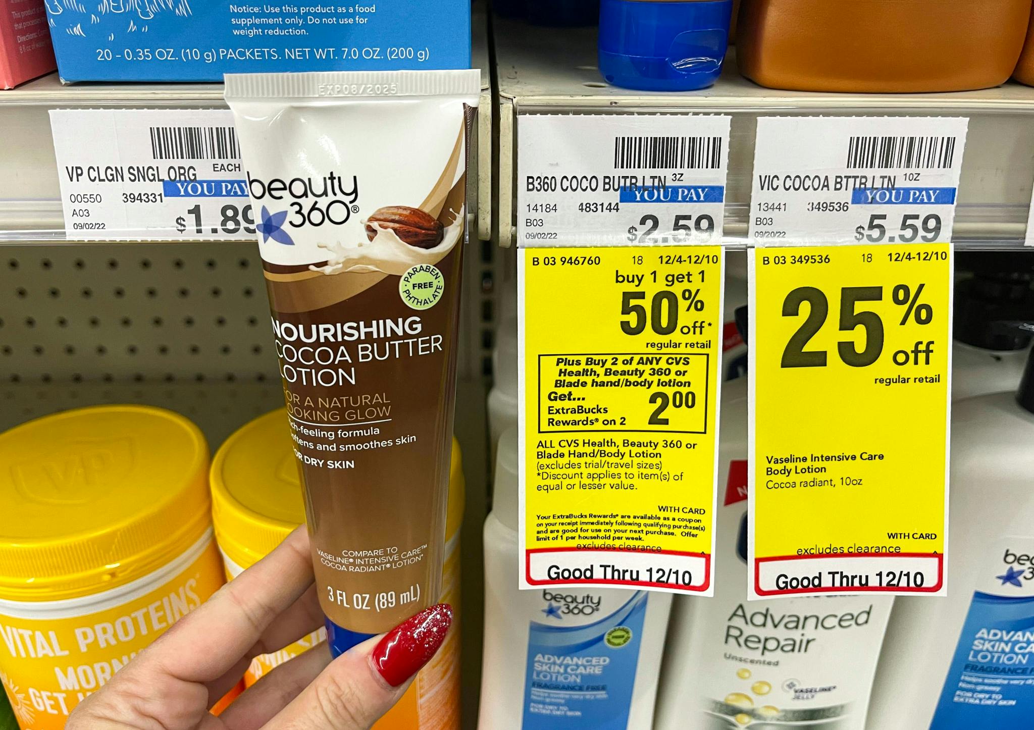 hand holding beauty 360 cocoa butter lotion next to sale tag