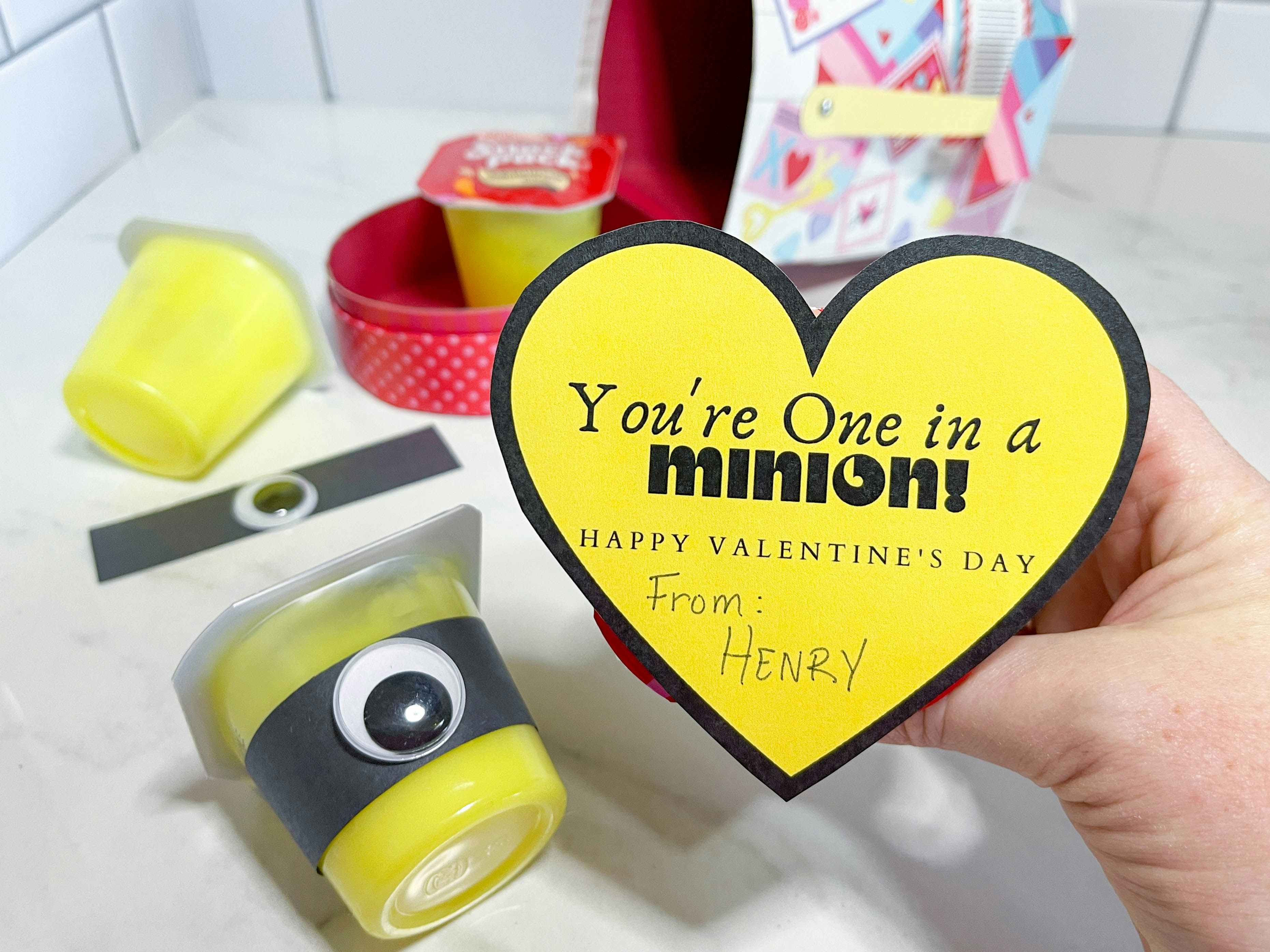 diy valentine to look like a minion made from a pudding cup
