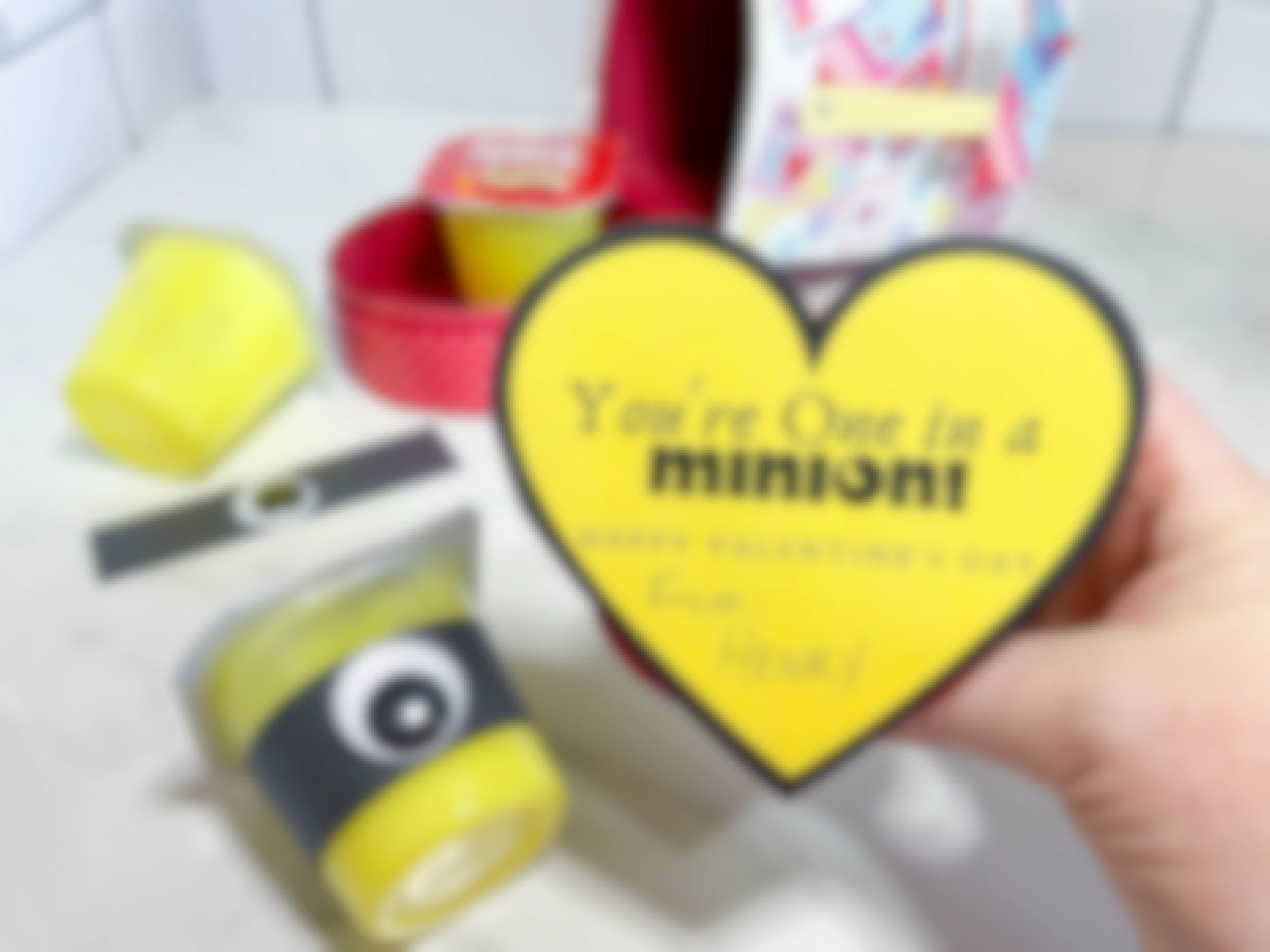 diy valentine to look like a minion made from a pudding cup