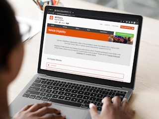 A person looking at the military appreciation offers from GM