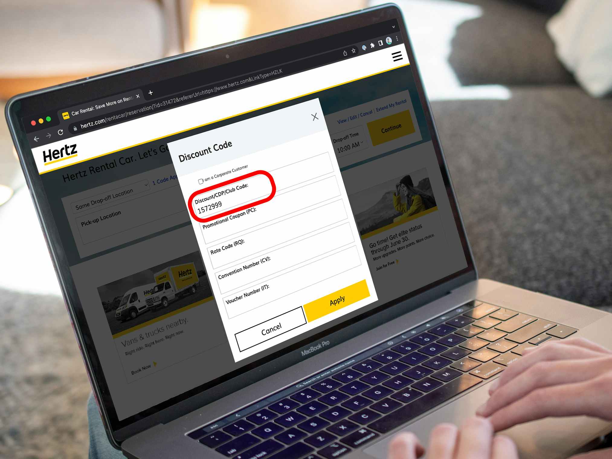 Someone putting in the military discount promo code into the form on Hertz.com