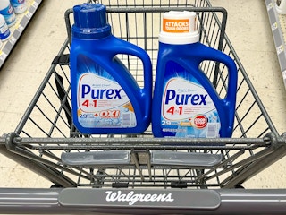 two bottle of purex detergent inside of shopping cart