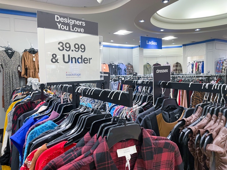a clothing rack at Macy's Backstage with a sign on top that says "Designers you love, $39.99 & Under.