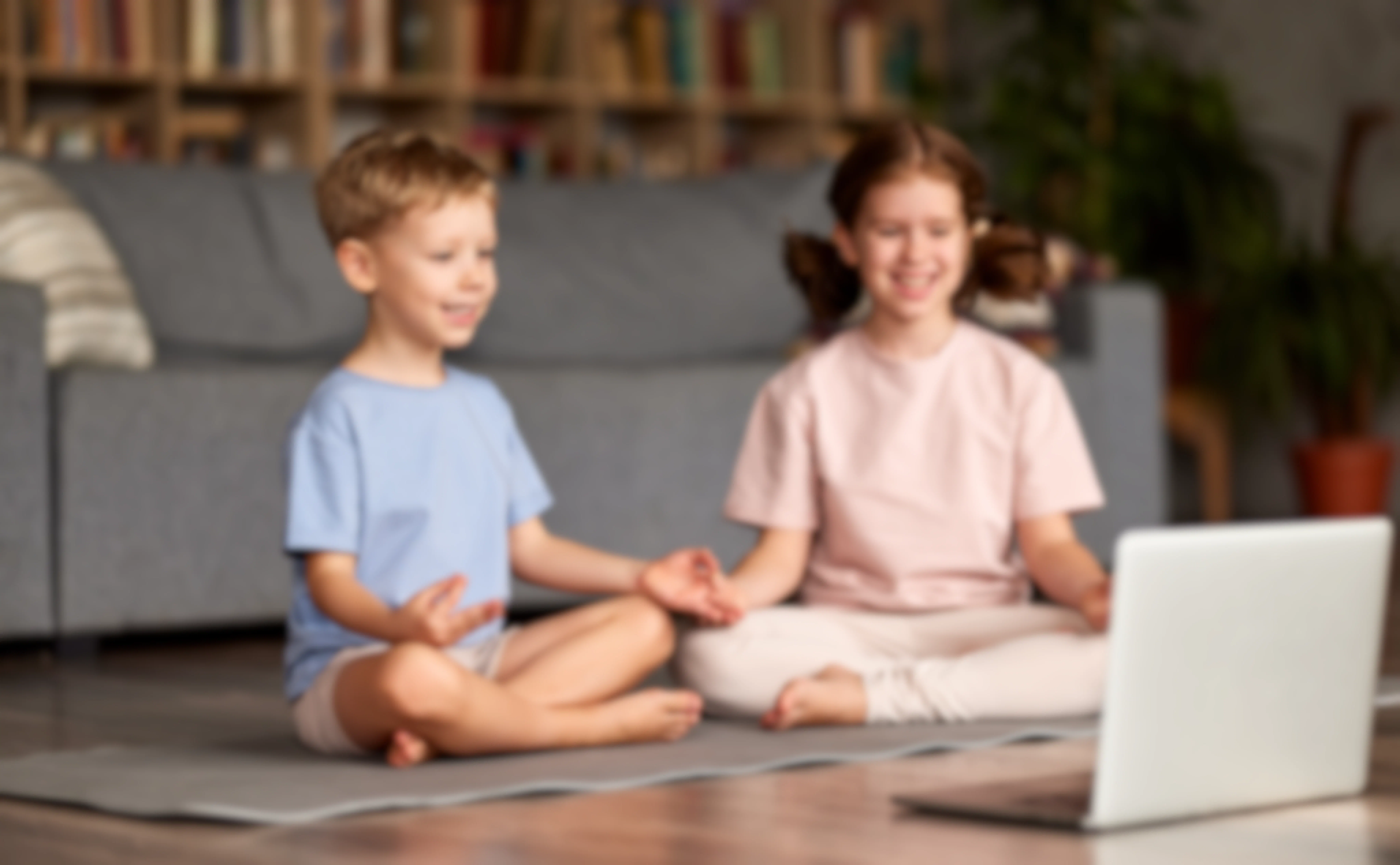 Kids practicing yoga online