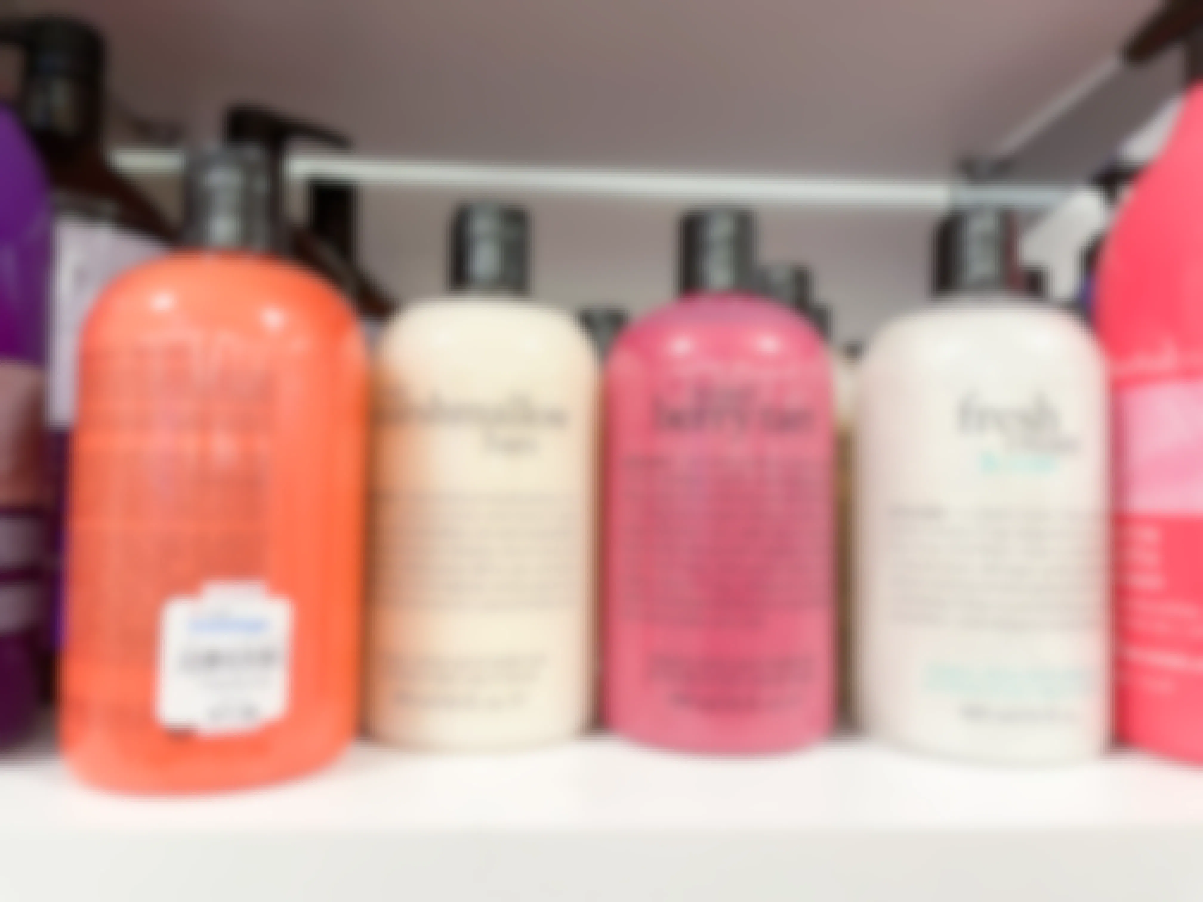 a variety of philosophy shower gels on the shelf in the beauty section of Macy's Backstage