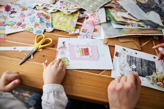 Parent and child scrapbooking together
