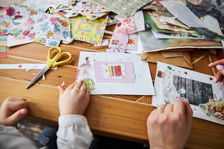Parent and child scrapbooking together