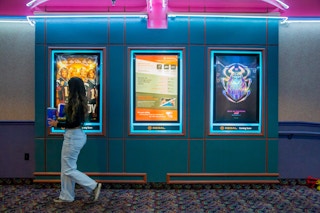 Woman walking though Regal Cinemas