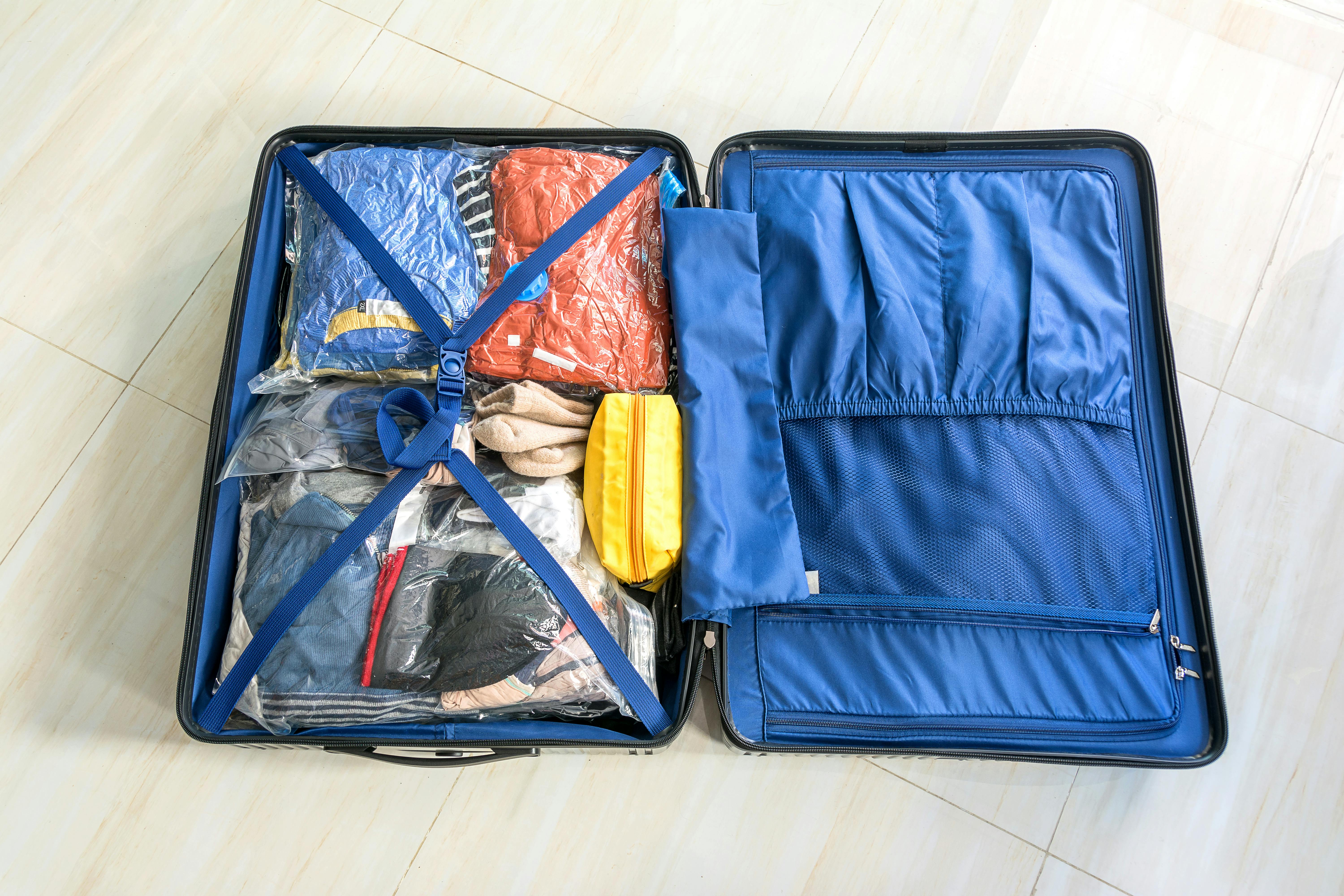 Packing luggage with resealable bags to save space