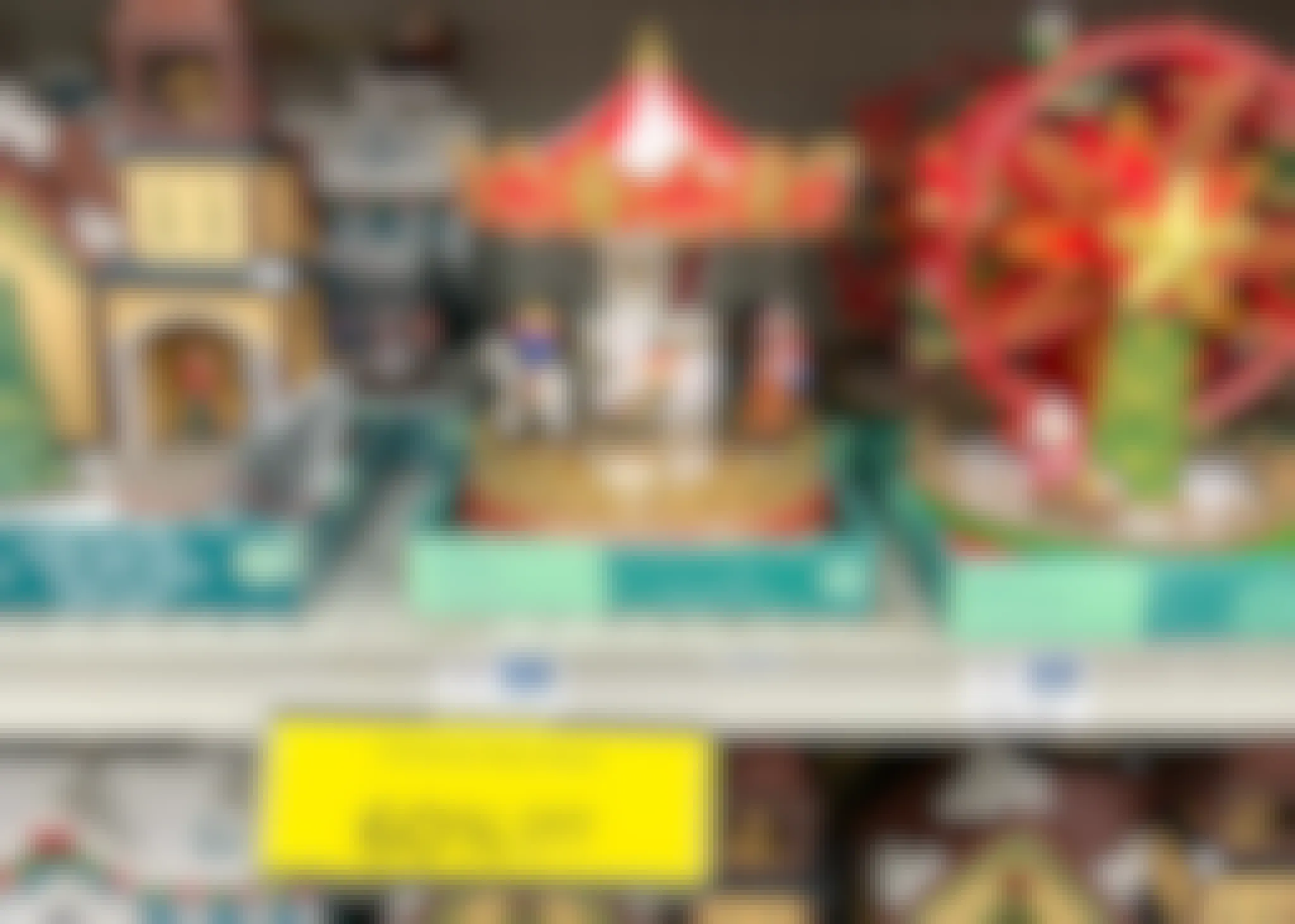 christmas carousel on shelf above sale tag
