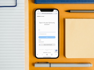 samsung login screen on iphone with office supplies