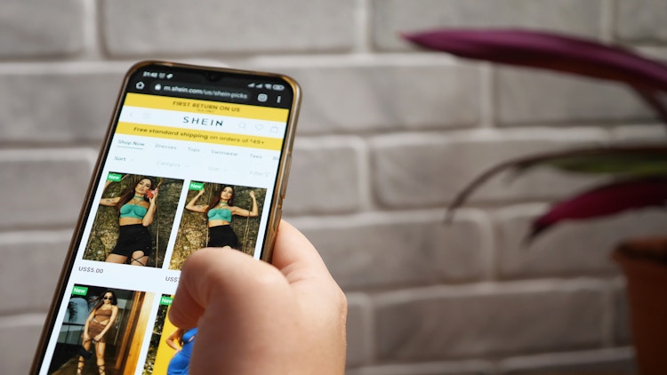 Person shopping on shein app