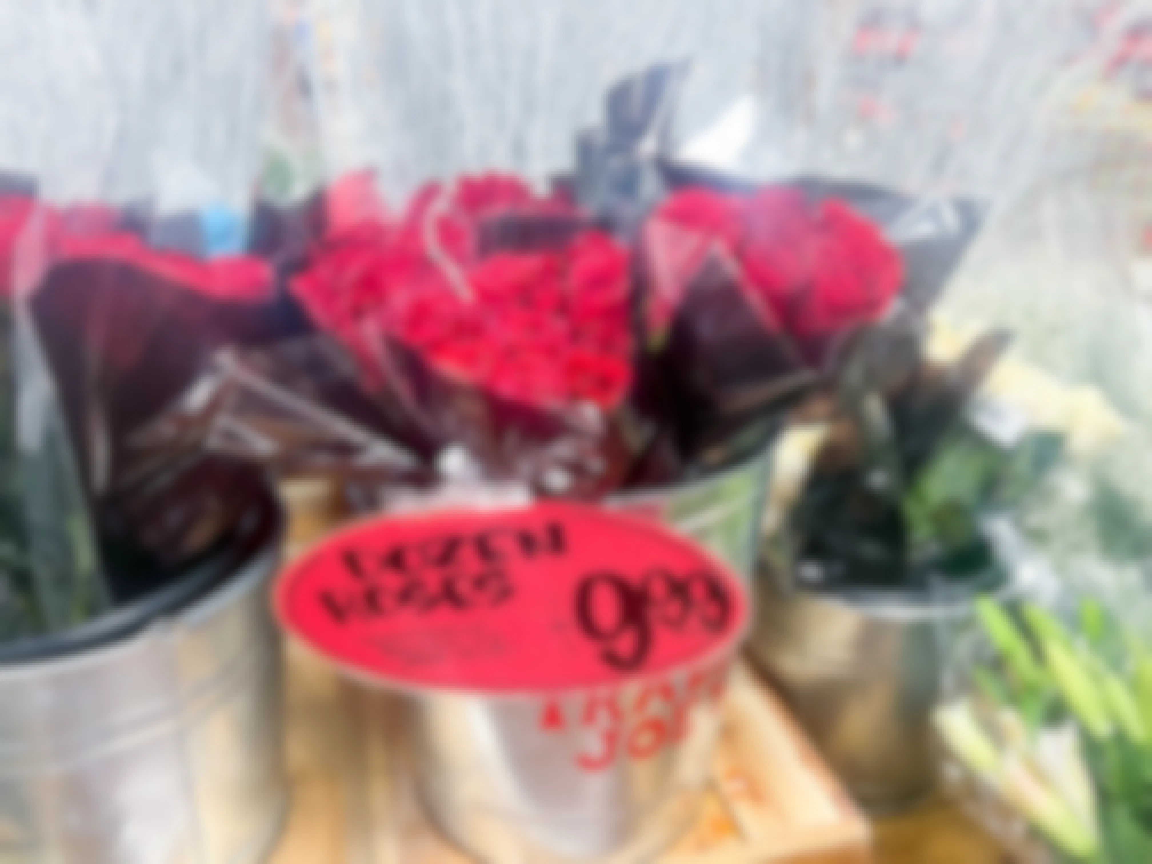 container of red roses at trader joes