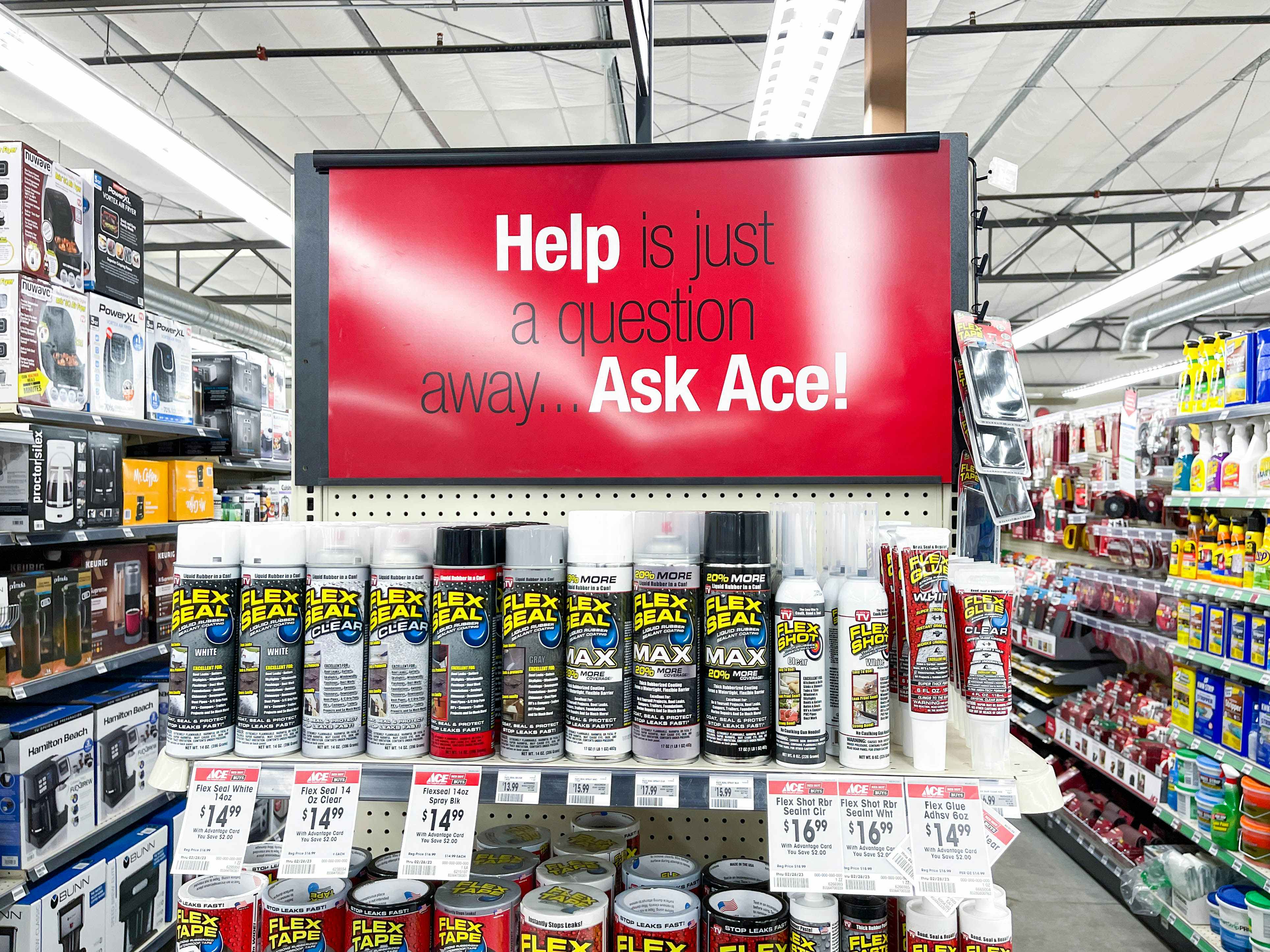 sign about asking for help in a sign in an ace hardware store