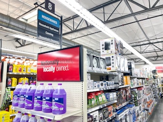 sign about locally owned in a sign in an ace hardware store
