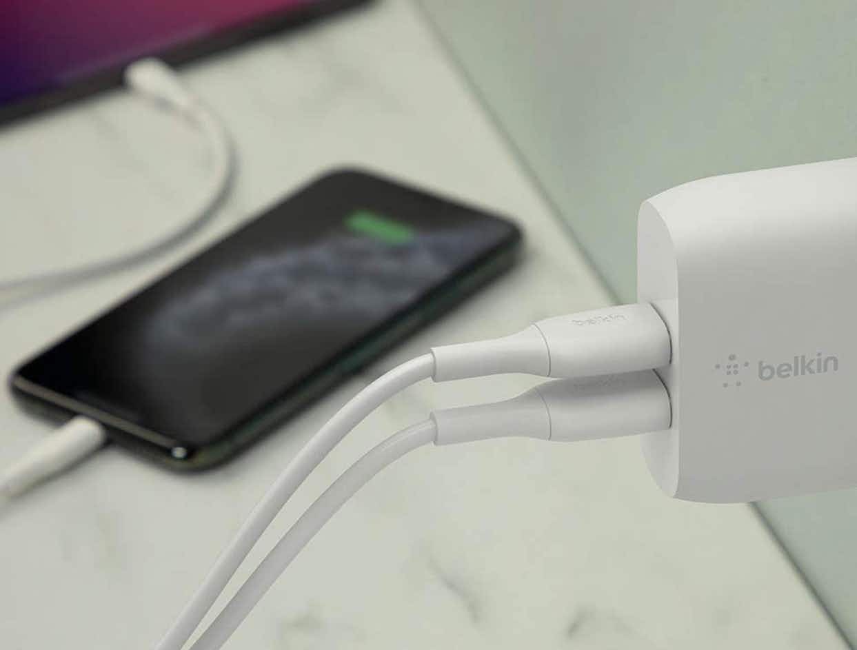 a belkin wall charger plugged into an outlet
