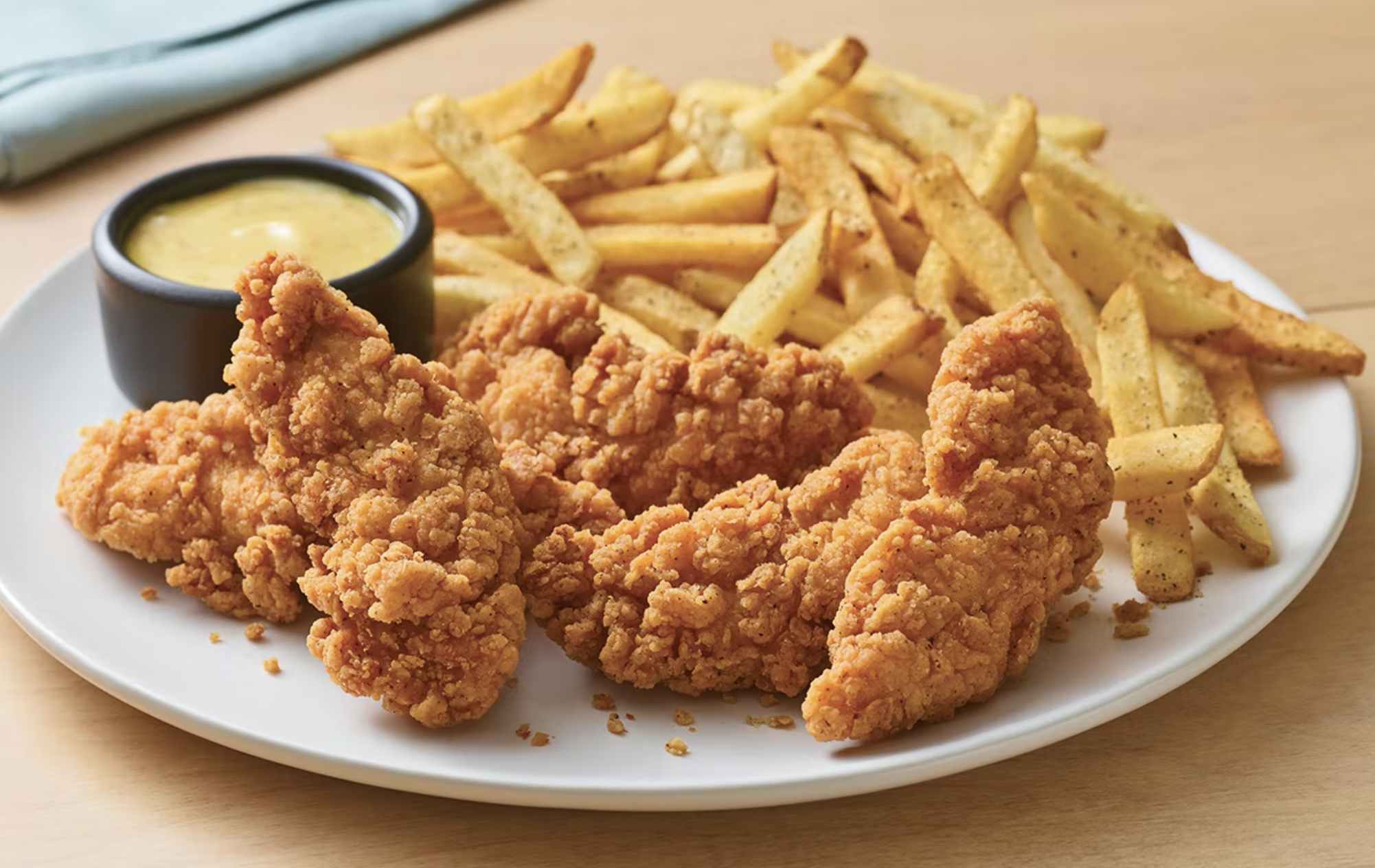 The official photo of the Applebee's chicken tenders plate, the cheapest thing you can buy to get a kids eat free meal.