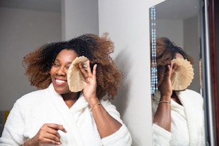 Using a coffee filter as a blot paper for face