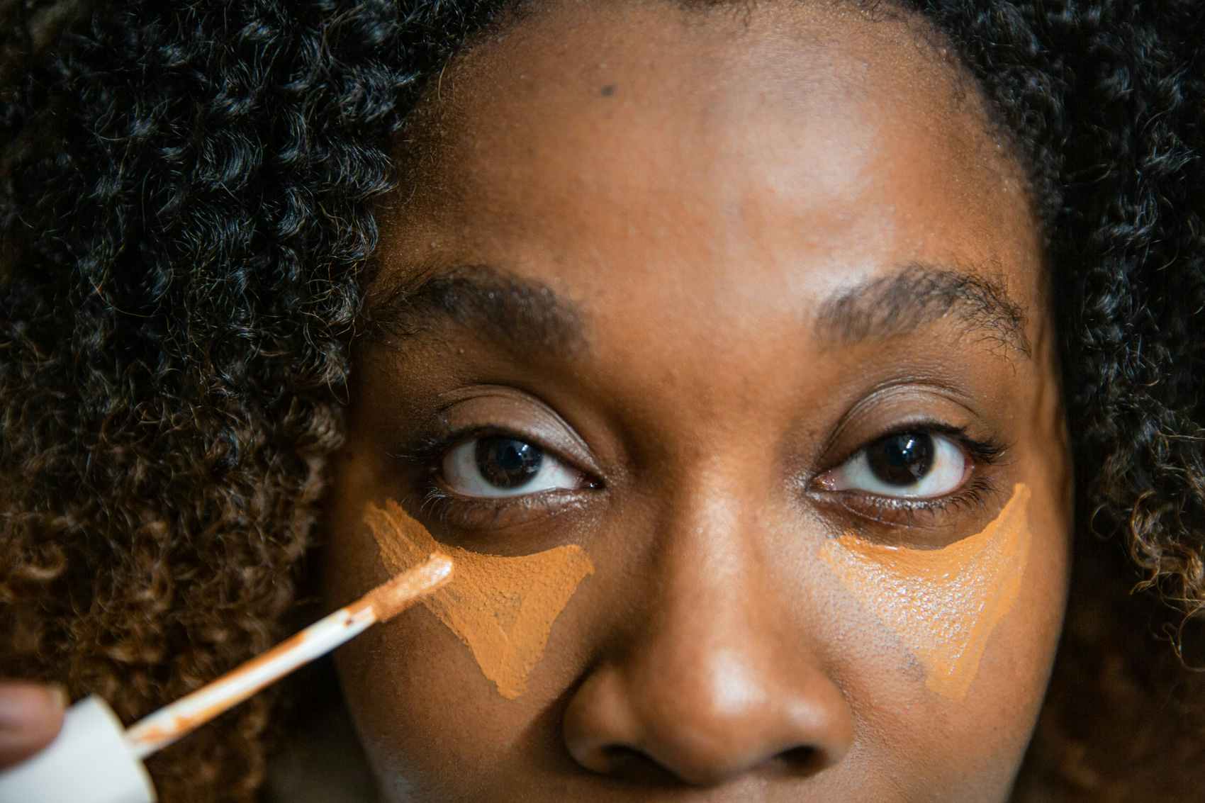 Putting concealer on in triangles help with dark circle under eyes